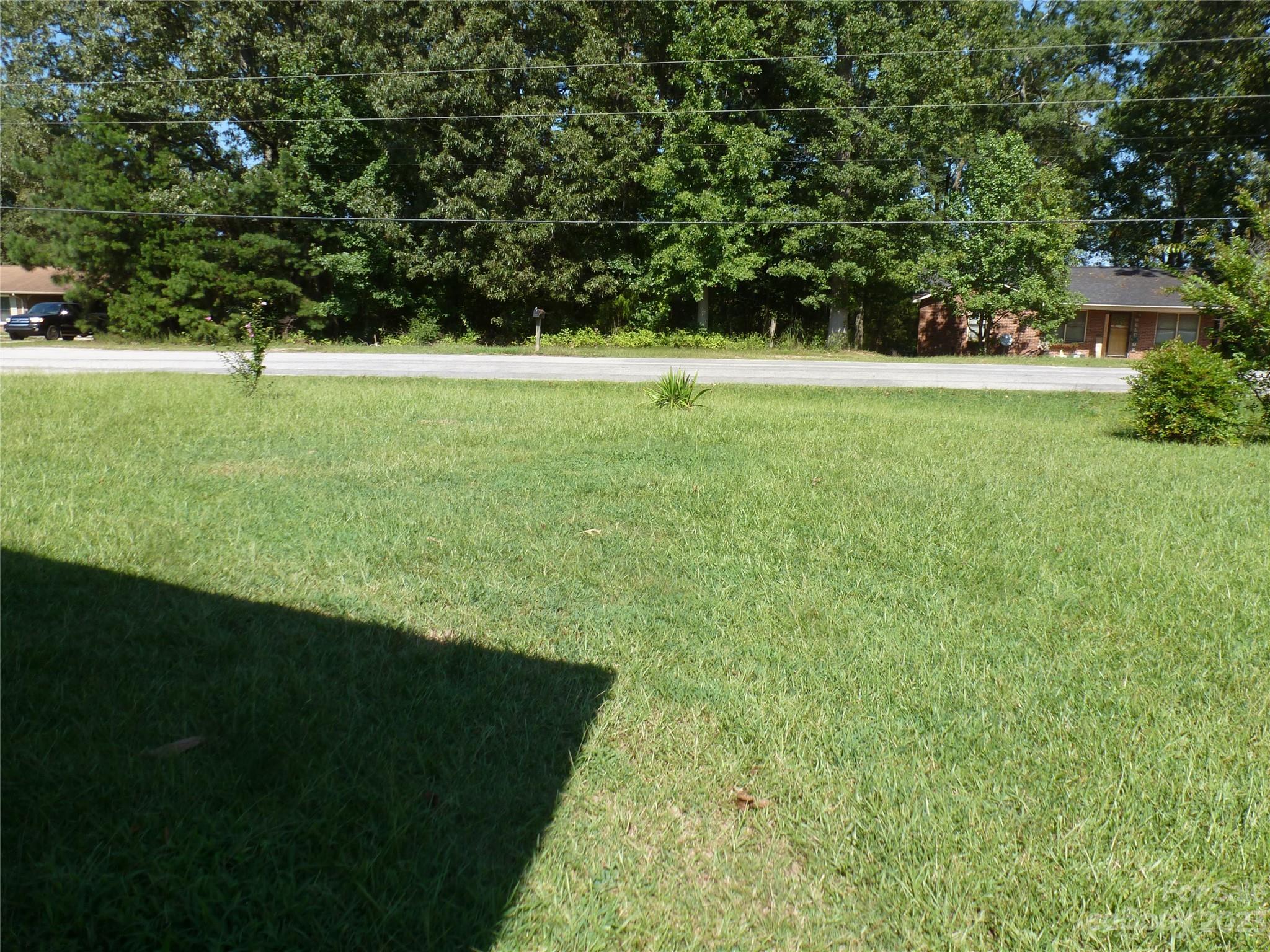 2804 Regency Road Lancaster, SC 29720 - Photo 8 of 8 a view of field with grass and trees