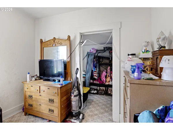 a view of a bedroom with baby toys