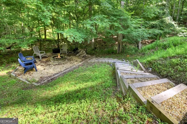 a bathroom with a toilet a sink and a shower