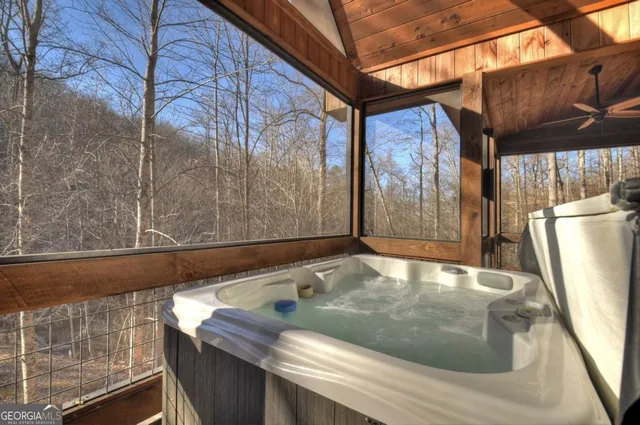 a view of a backyard with large trees