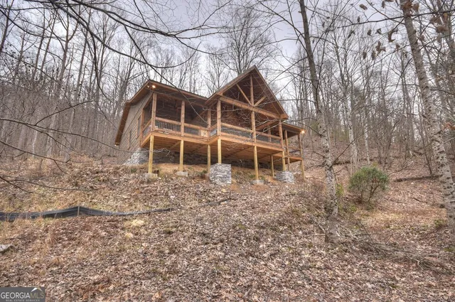 a view of a lake with a large trees