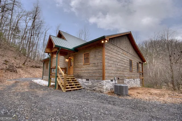 a view of a lake with a yard