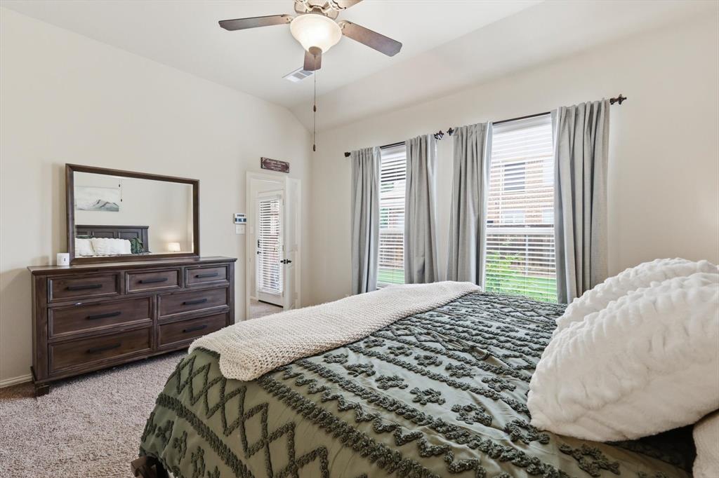 7105 Edwards Road Denton, TX 76208 - Photo 22 of 40 Primary suite with large windows and room for full furnishings.