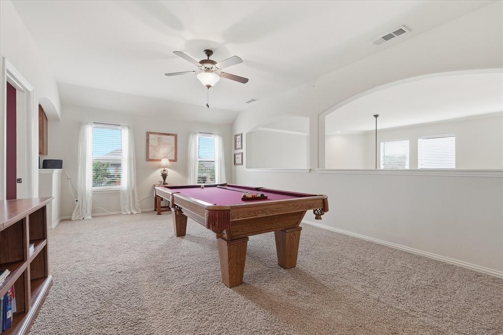 7105 Edwards Road Denton, TX 76208 - Photo 25 of 40 Large flex space with natural light—ideal for a game room or second living area.
