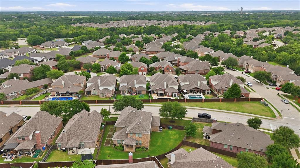 7105 Edwards Road Denton, TX 76208 - Photo 37 of 40 Bird’s-eye view of the surrounding community and nearby homes.