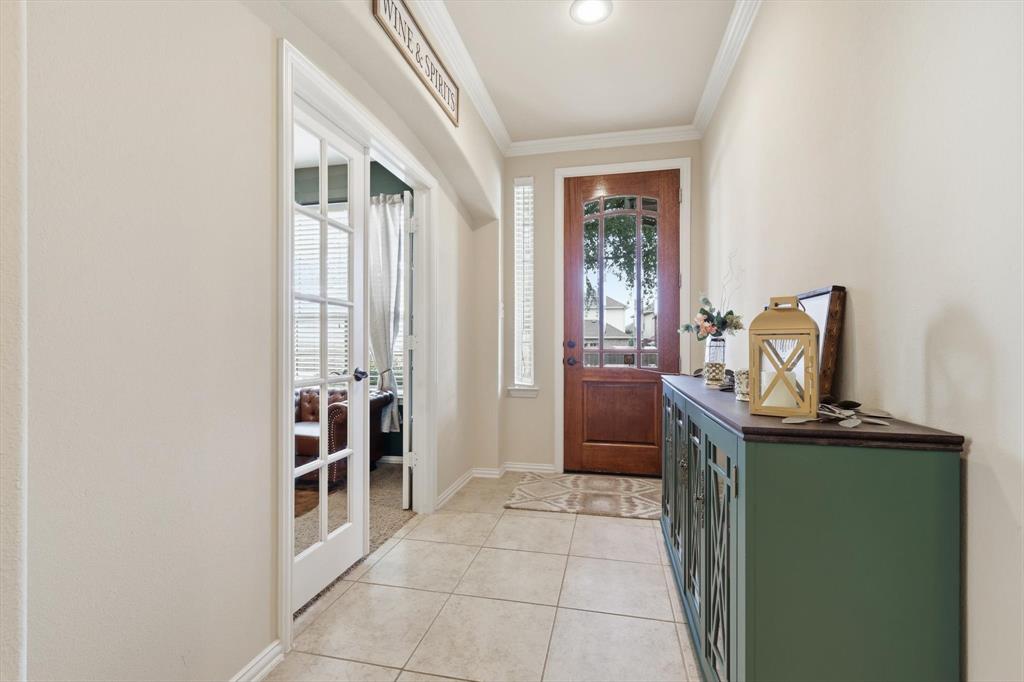 7105 Edwards Road Denton, TX 76208 - Photo 6 of 40 Bright entry with tile flooring and access to a private office.