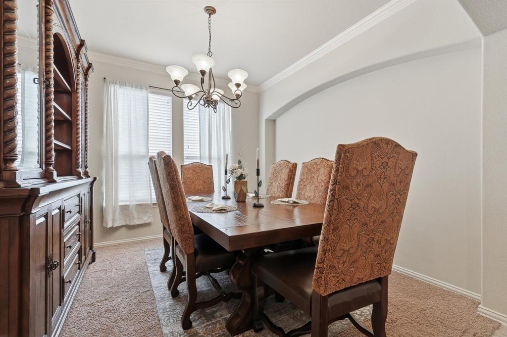 7105 Edwards Road Denton, TX 76208 - Photo 10 of 40 Dedicated dining space with natural light and room for gatherings.
