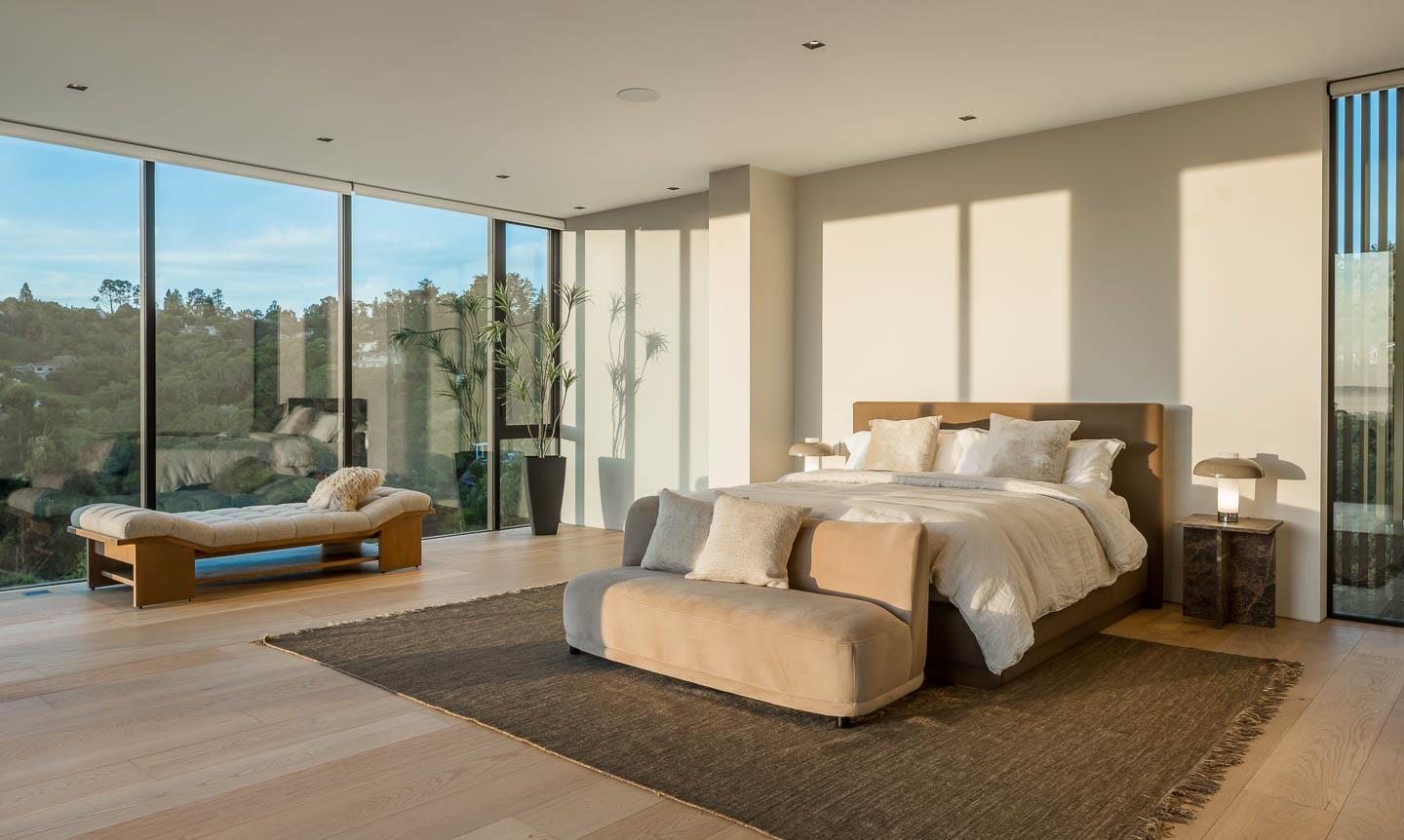 455 Pinehill Road Hillsborough, CA 94010 - Photo 17 of 33 a spacious bedroom with a bed and glass window