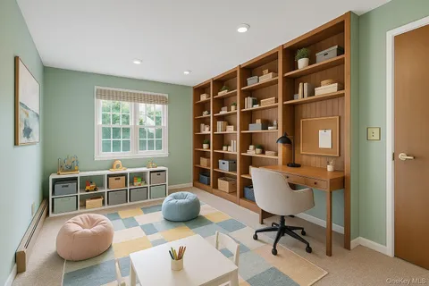 a view of a livingroom with furniture and windows