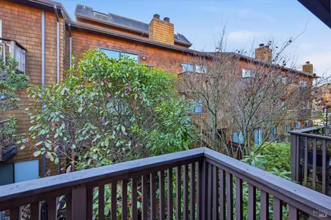 a view of a building from a balcony
