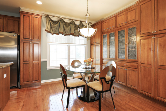 2808 Commons Drive Glenview, IL 60026 - Photo 7 of 14 a view of a dining room with furniture window and wooden floor