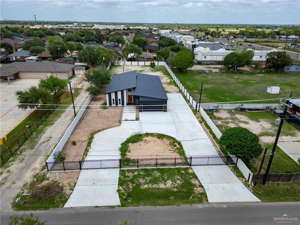 106 West Eldora Road San Juan, TX 78589 - Photo 2 of 29 an aerial view of residential houses with outdoor space and swimming pool