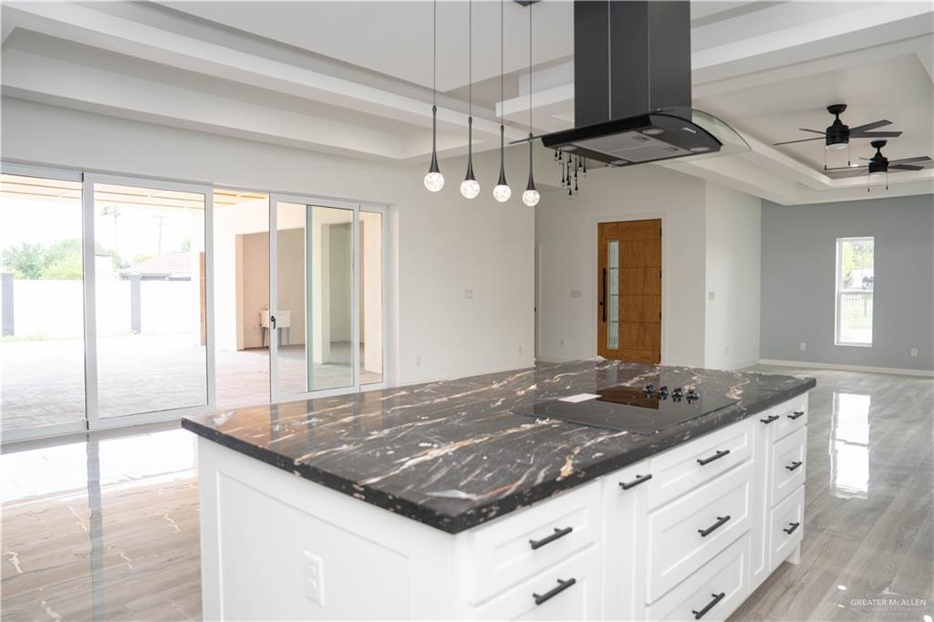 106 West Eldora Road San Juan, TX 78589 - Photo 23 of 29 a bathroom with a granite countertop sink and a large mirror