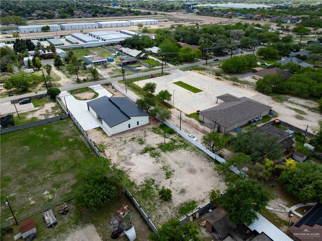 106 West Eldora Road San Juan, TX 78589 - Photo 28 of 29 an aerial view of residential houses with outdoor space and swimming pool