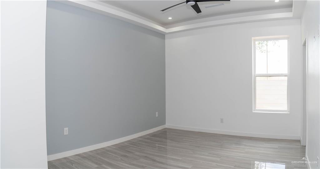 106 West Eldora Road San Juan, TX 78589 - Photo 8 of 29 an empty room with a window