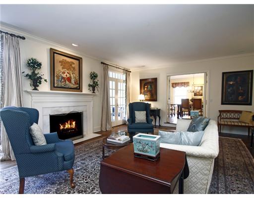 292 Brushy Ridge Road New Canaan, CT 06840 - Photo 3 of 16 a living room with furniture and a fireplace
