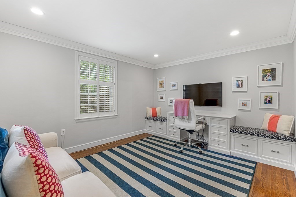104 Westgate Wellesley, MA 02481 - Photo 16 of 31 a living room with furniture and a flat screen tv