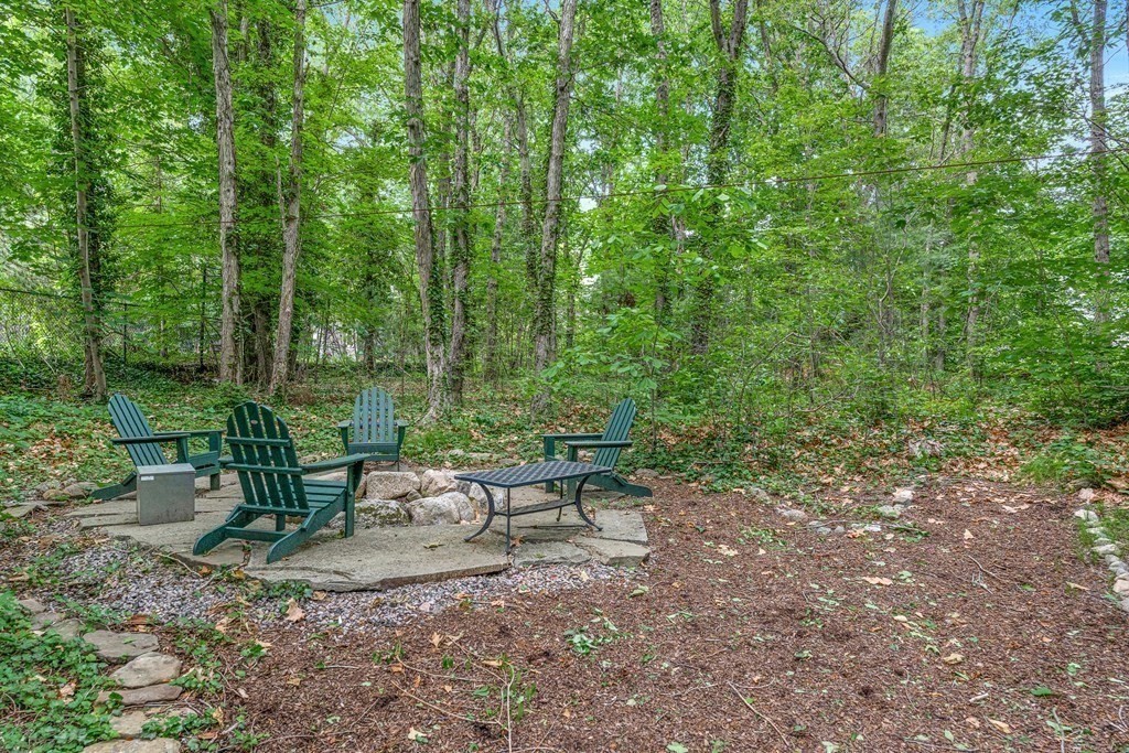 104 Westgate Wellesley, MA 02481 - Photo 27 of 31 a view of a bench in a garden