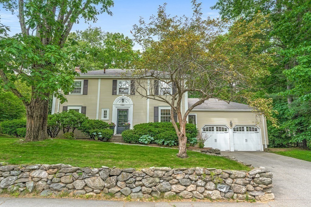 104 Westgate Wellesley, MA 02481 - Photo 3 of 31 a front view of a house with garden