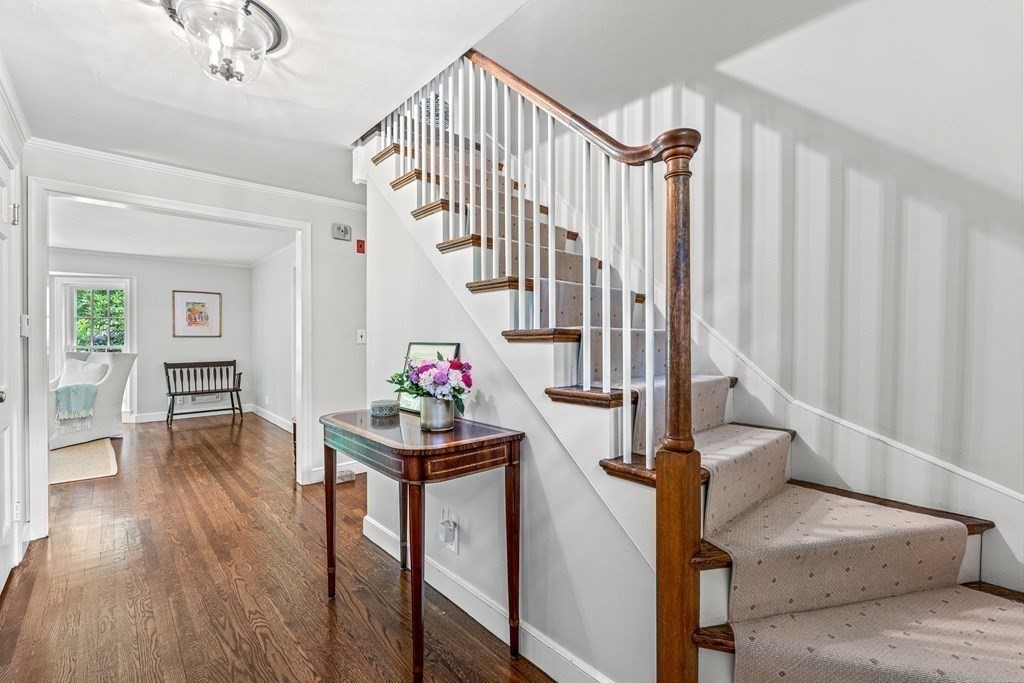 104 Westgate Wellesley, MA 02481 - Photo 5 of 31 a view of entryway and hall with wooden floor