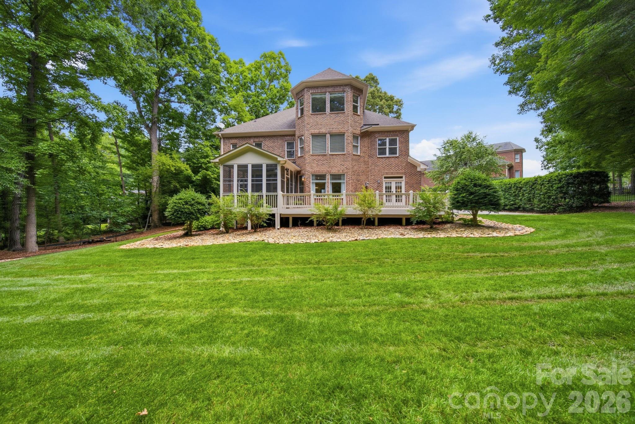 1802 Summit View Place Waxhaw, NC 28173 - Photo 42 of 47 a front view of a house with a garden