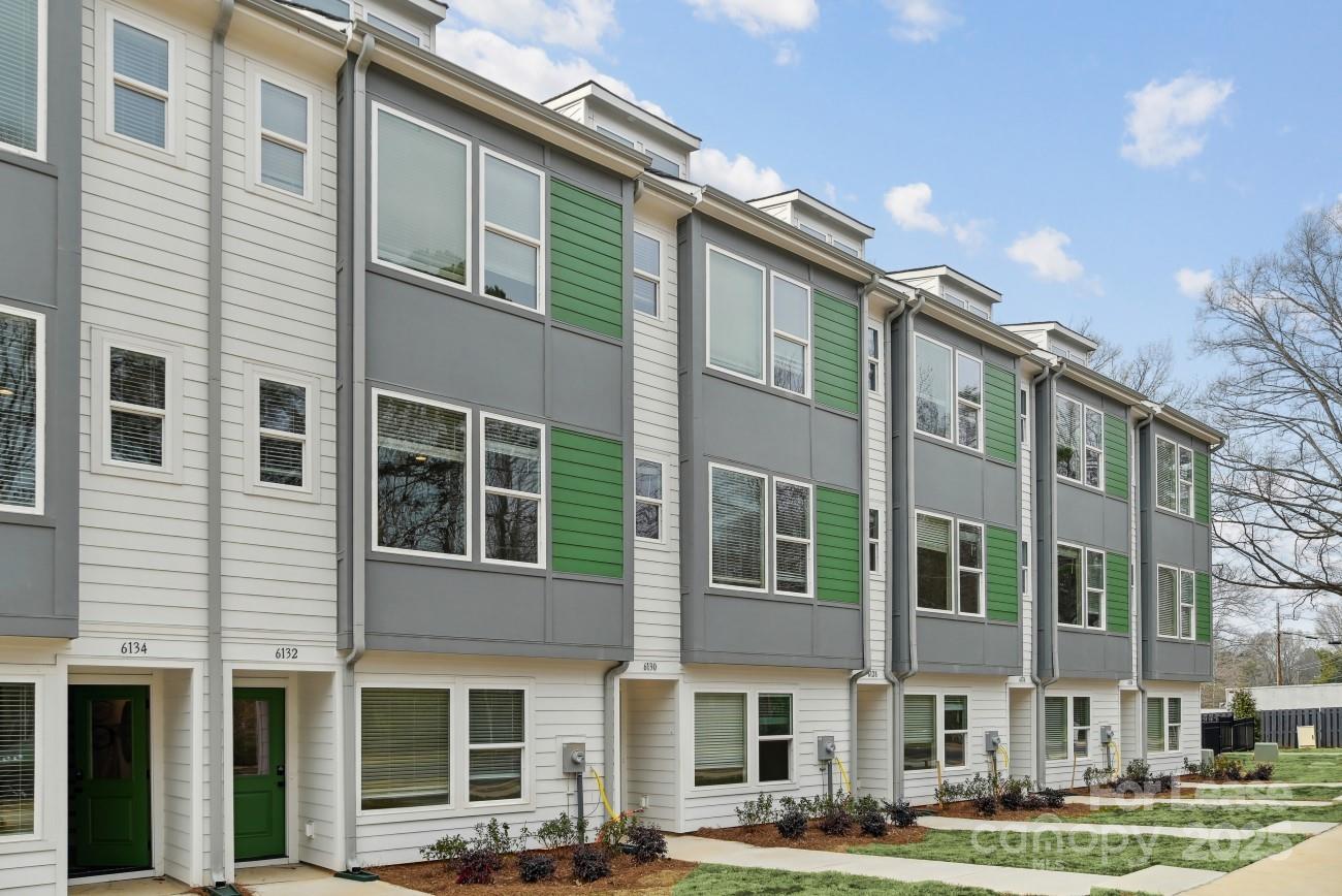 6134 Wilora Lake Road Charlotte, NC 28212 - Photo 20 of 21 a front view of a multi story building