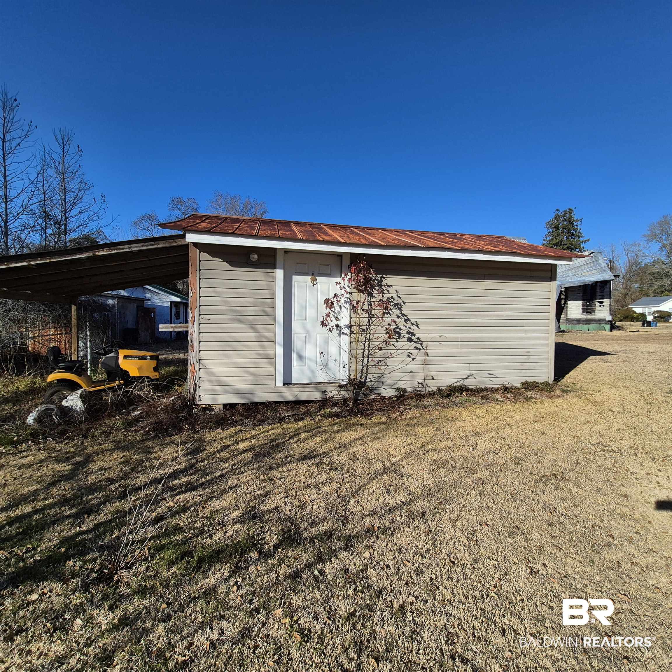 320 Bruner Avenue Evergreen, AL 36401 - Photo 12 of 15 View of outbuilding with a carport