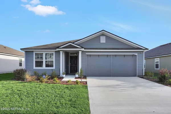 a front view of house with yard