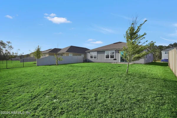 a house view with a garden space