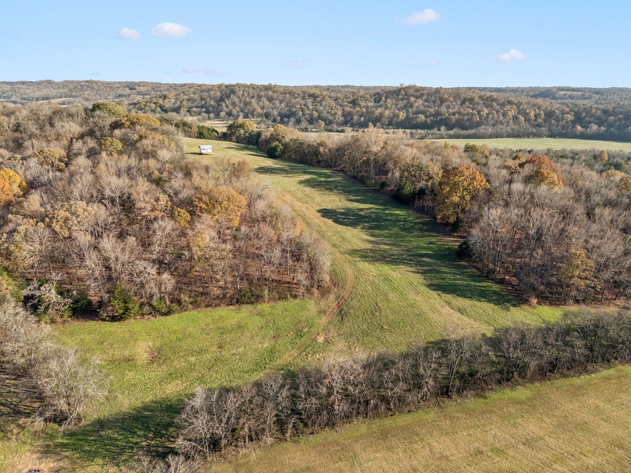 935 Leatherwood Creek Road Pulaski, TN 38478 - Photo 13 of 36 a view of a lake with a yard