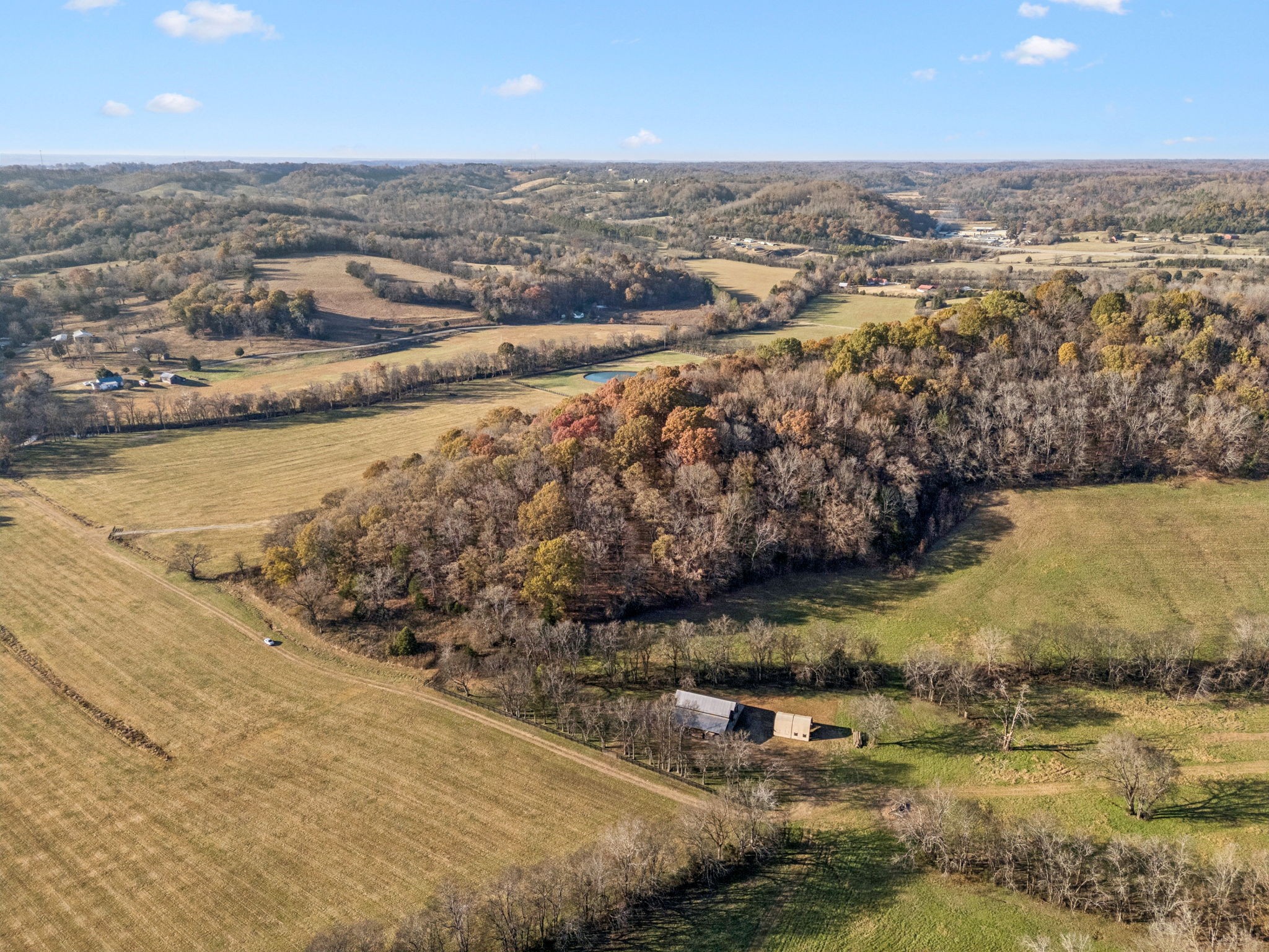 935 Leatherwood Creek Road Pulaski, TN 38478 - Photo 18 of 36 an aerial view of residential houses with outdoor space
