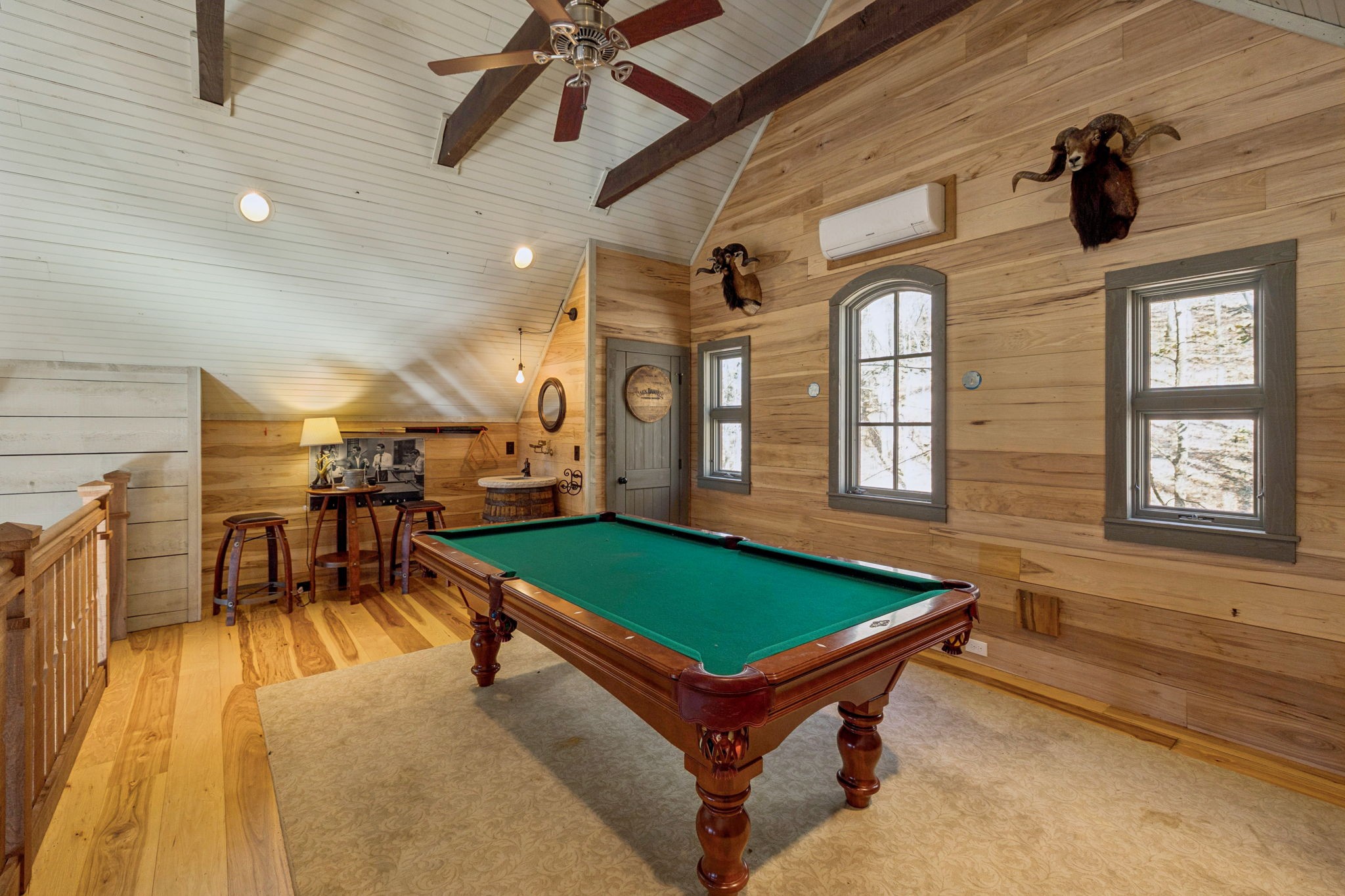 935 Leatherwood Creek Road Pulaski, TN 38478 - Photo 34 of 36 a room with lots of furniture and windows