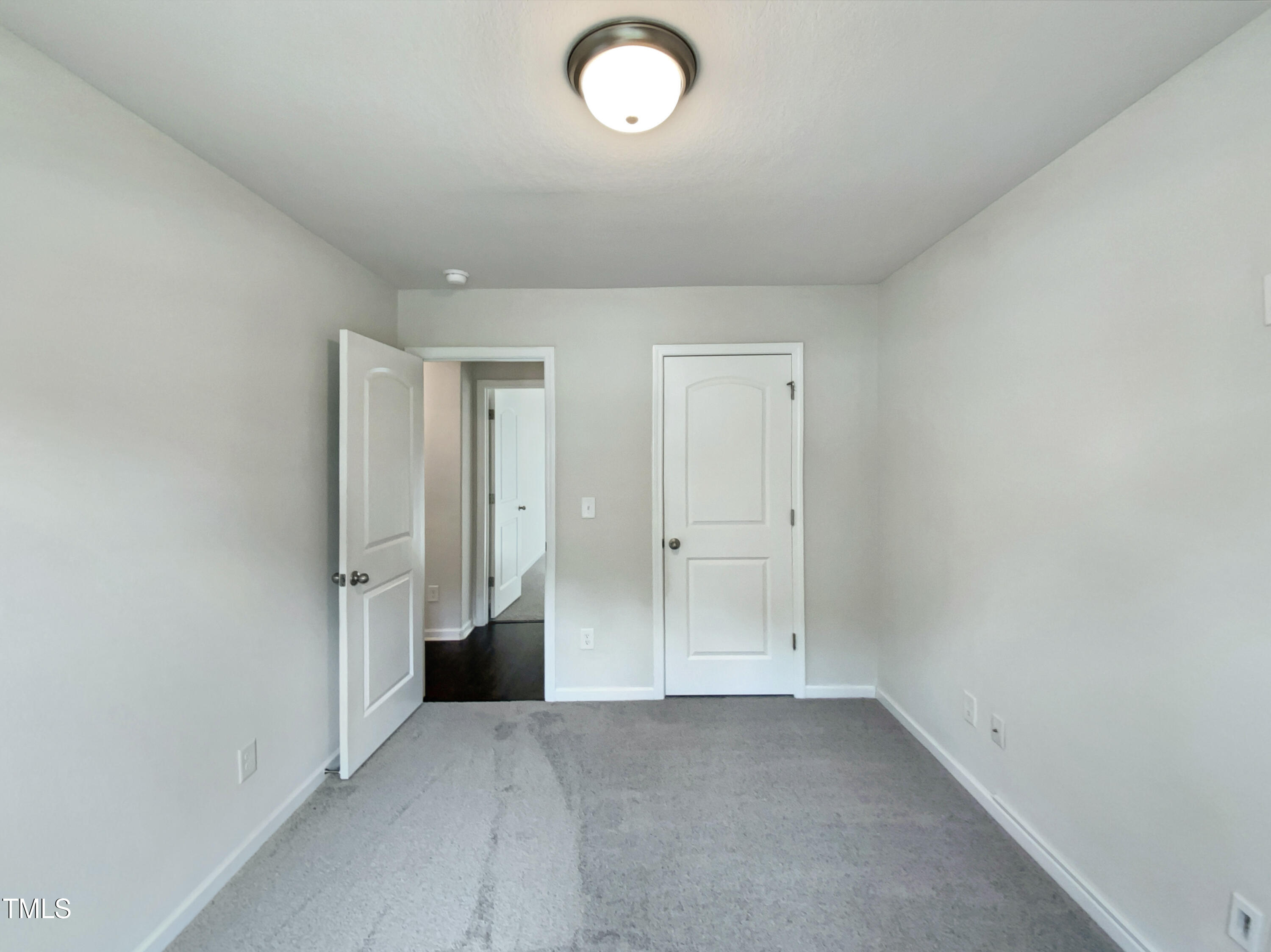 337 Rustling Way Zebulon, NC 27597 - Photo 14 of 19 a view of an empty room and a window