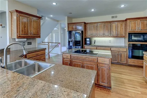 $717,777 | 9625 Cailler Drive, Lenexa, KS 66220
