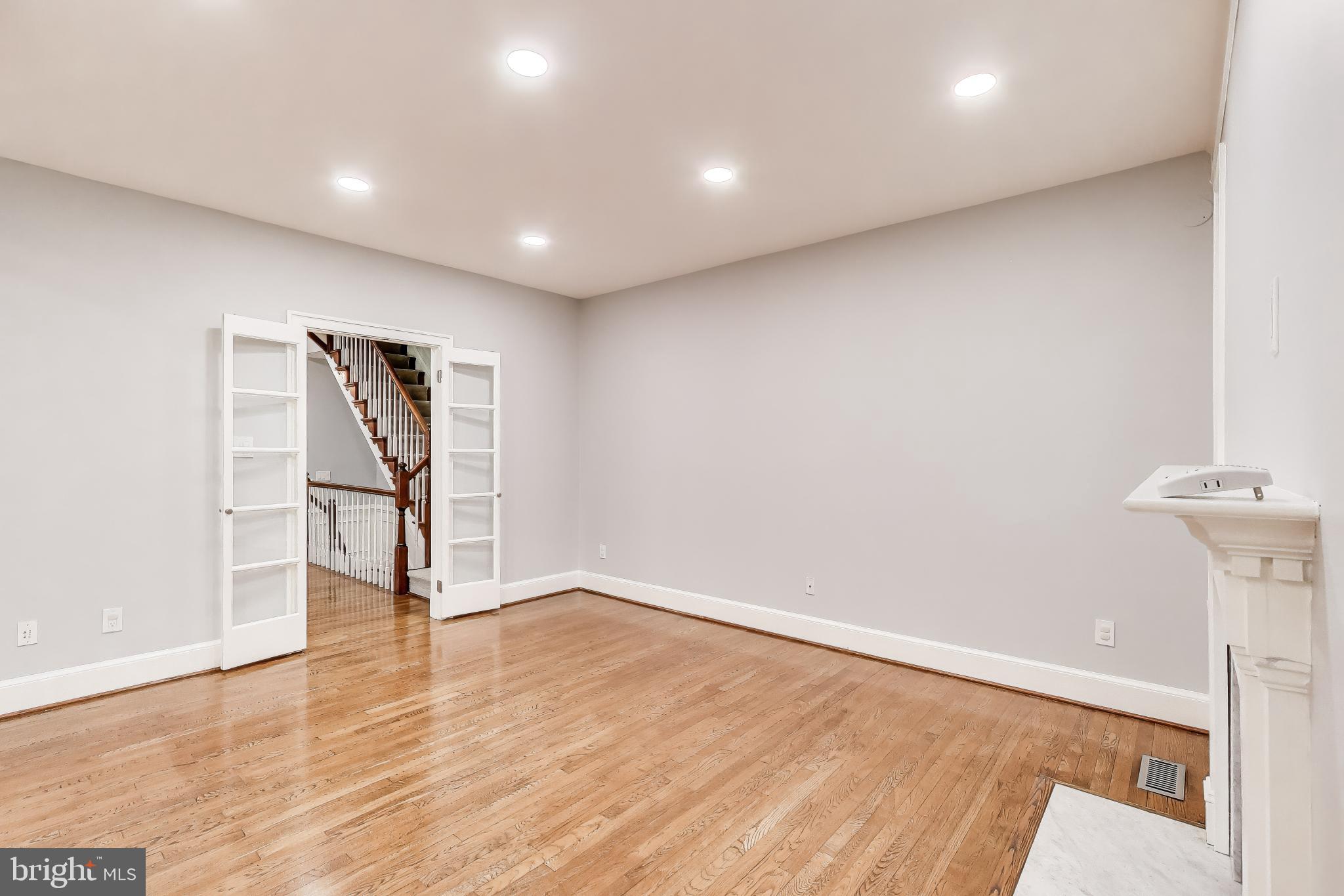 8017 Rising Ridge Road Bethesda, MD 20817 - Photo 15 of 54 a view of an empty room with wooden floor