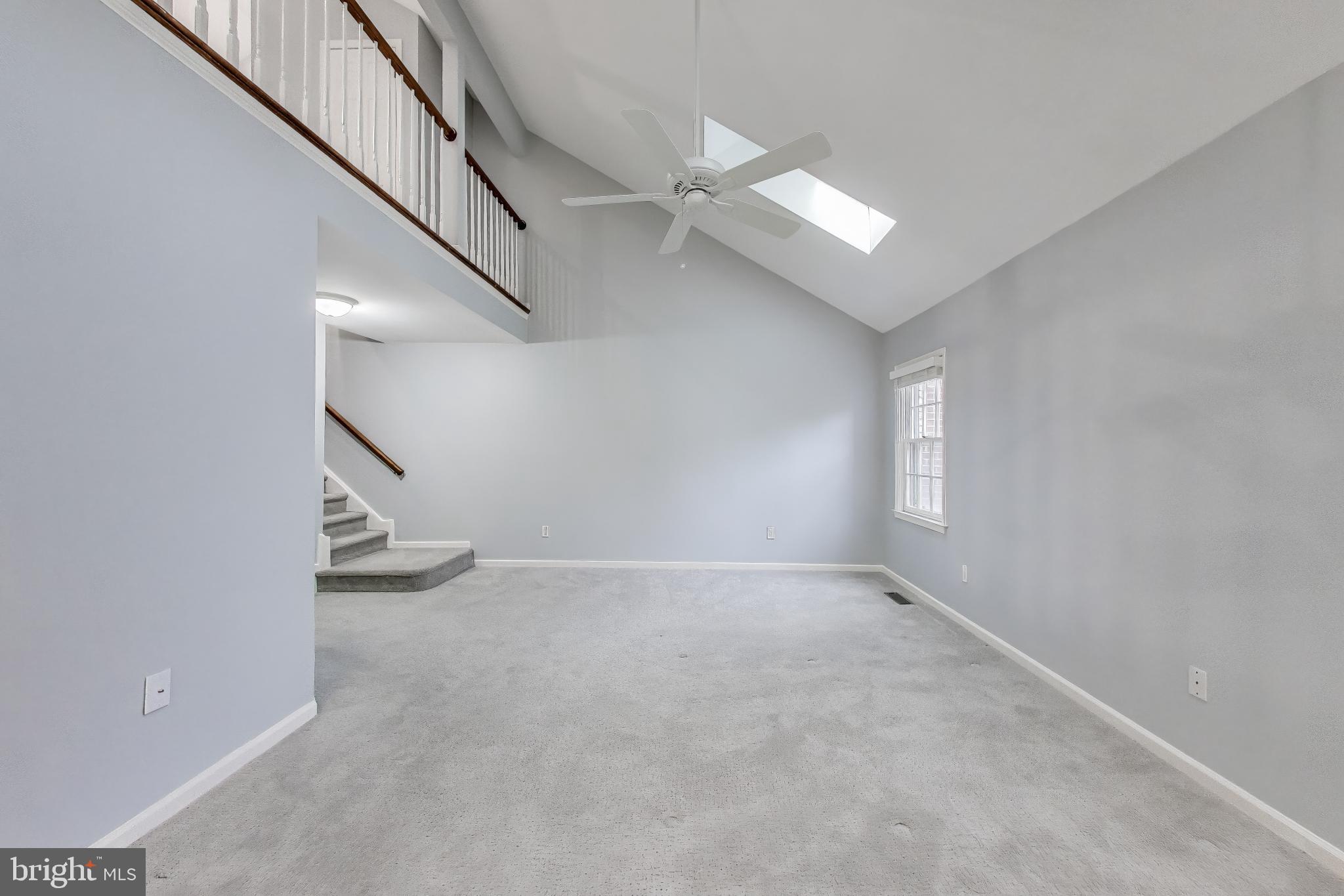 8017 Rising Ridge Road Bethesda, MD 20817 - Photo 19 of 54 an empty room with windows