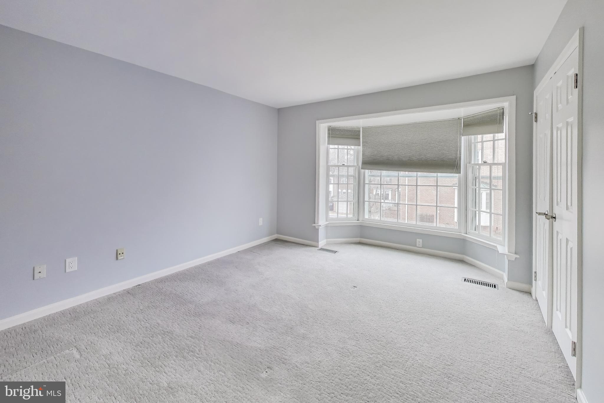 8017 Rising Ridge Road Bethesda, MD 20817 - Photo 26 of 54 an empty room with windows