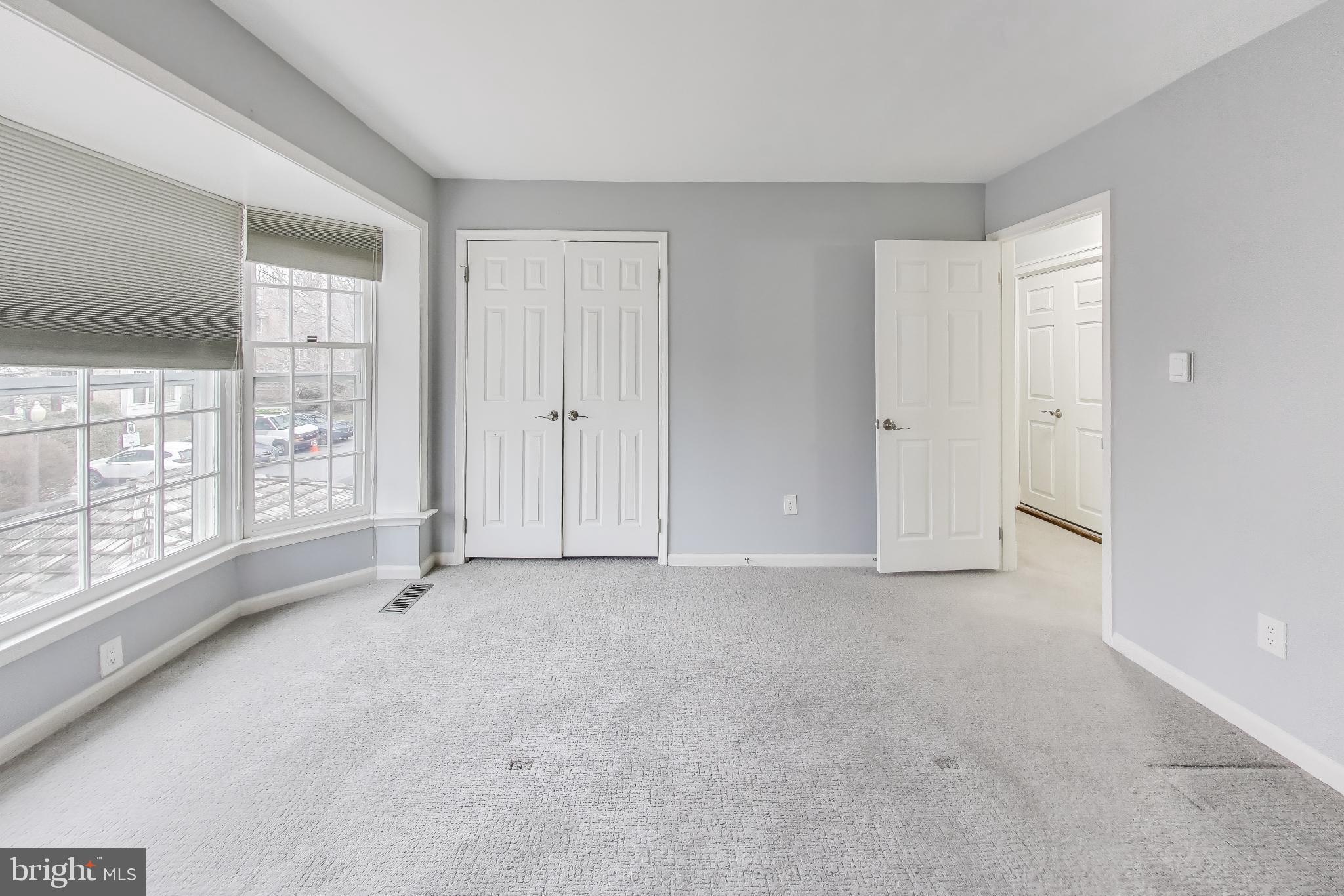 8017 Rising Ridge Road Bethesda, MD 20817 - Photo 28 of 54 a view of an empty room with a window