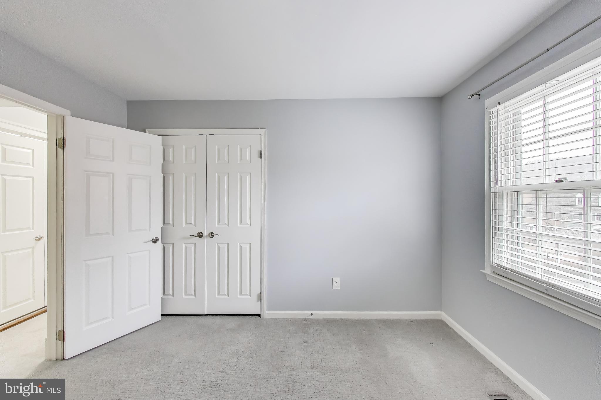 8017 Rising Ridge Road Bethesda, MD 20817 - Photo 31 of 54 a view of an empty room with a window