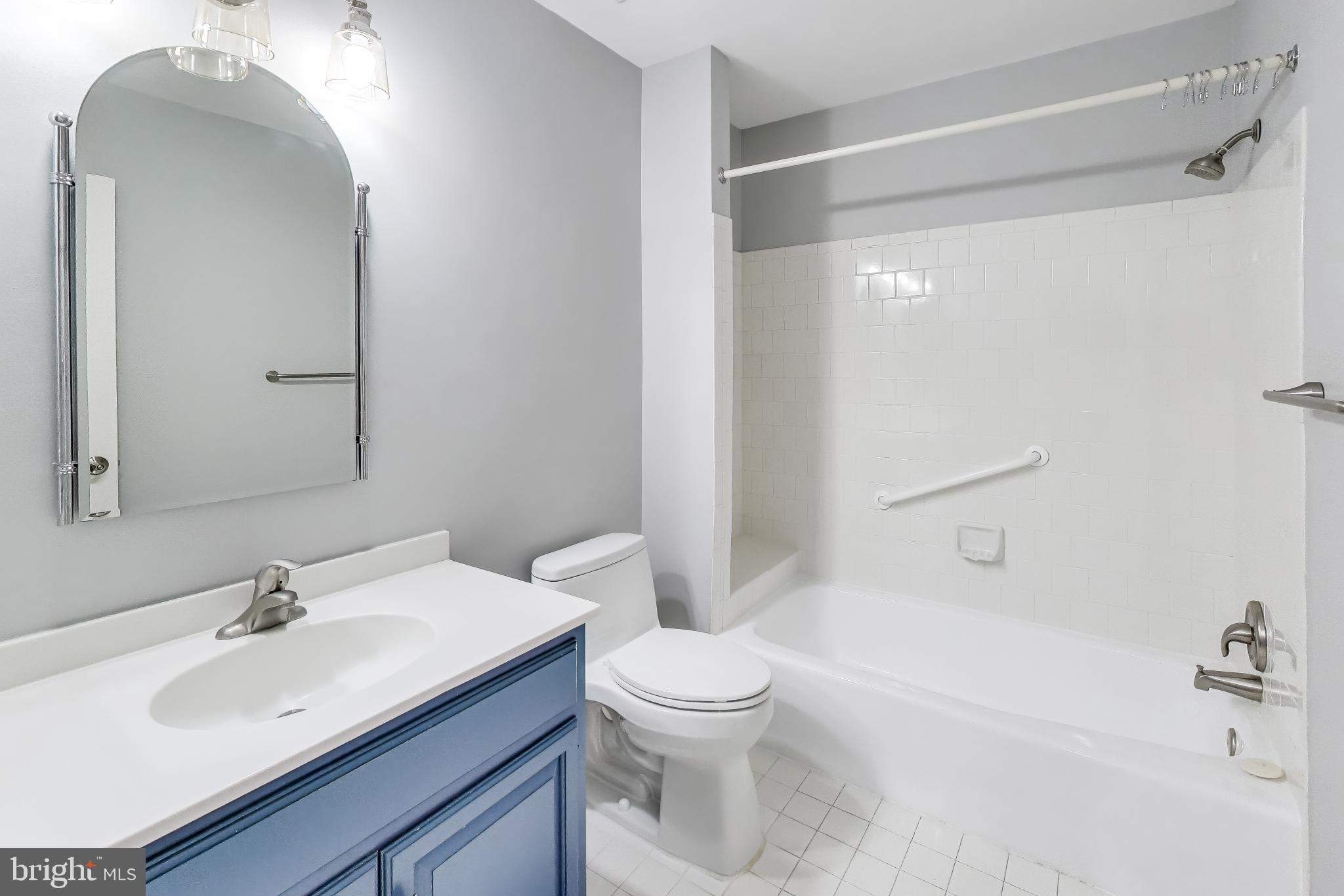 8017 Rising Ridge Road Bethesda, MD 20817 - Photo 32 of 54 a bathroom with a sink toilet and shower