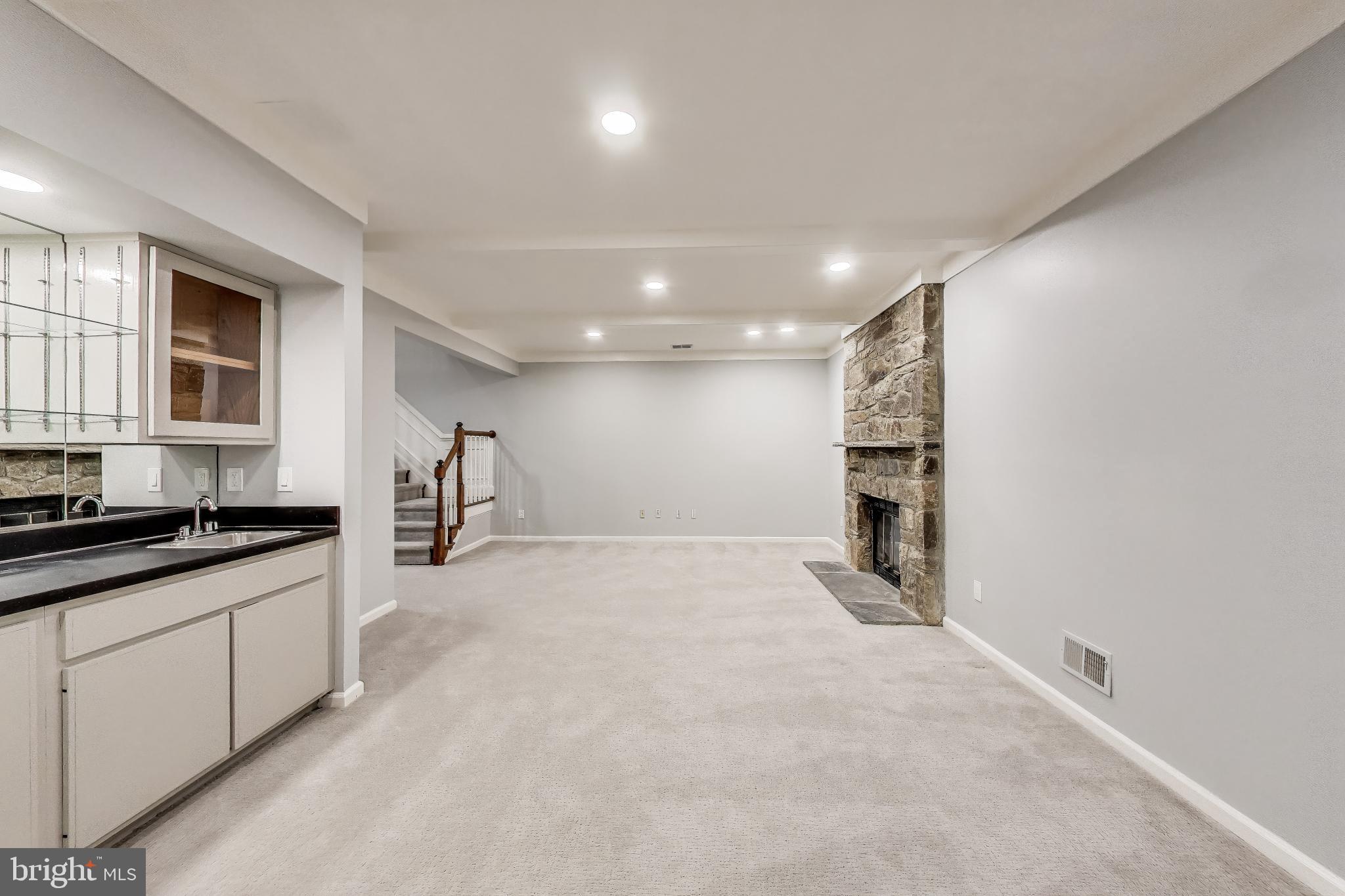 8017 Rising Ridge Road Bethesda, MD 20817 - Photo 36 of 54 a view of a kitchen with a sink and a window