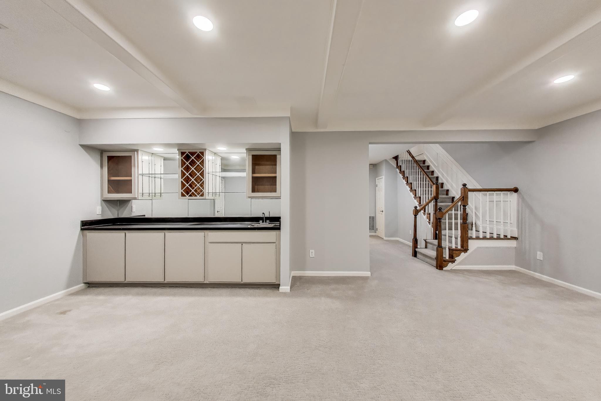 8017 Rising Ridge Road Bethesda, MD 20817 - Photo 37 of 54 a view of an empty room with windows