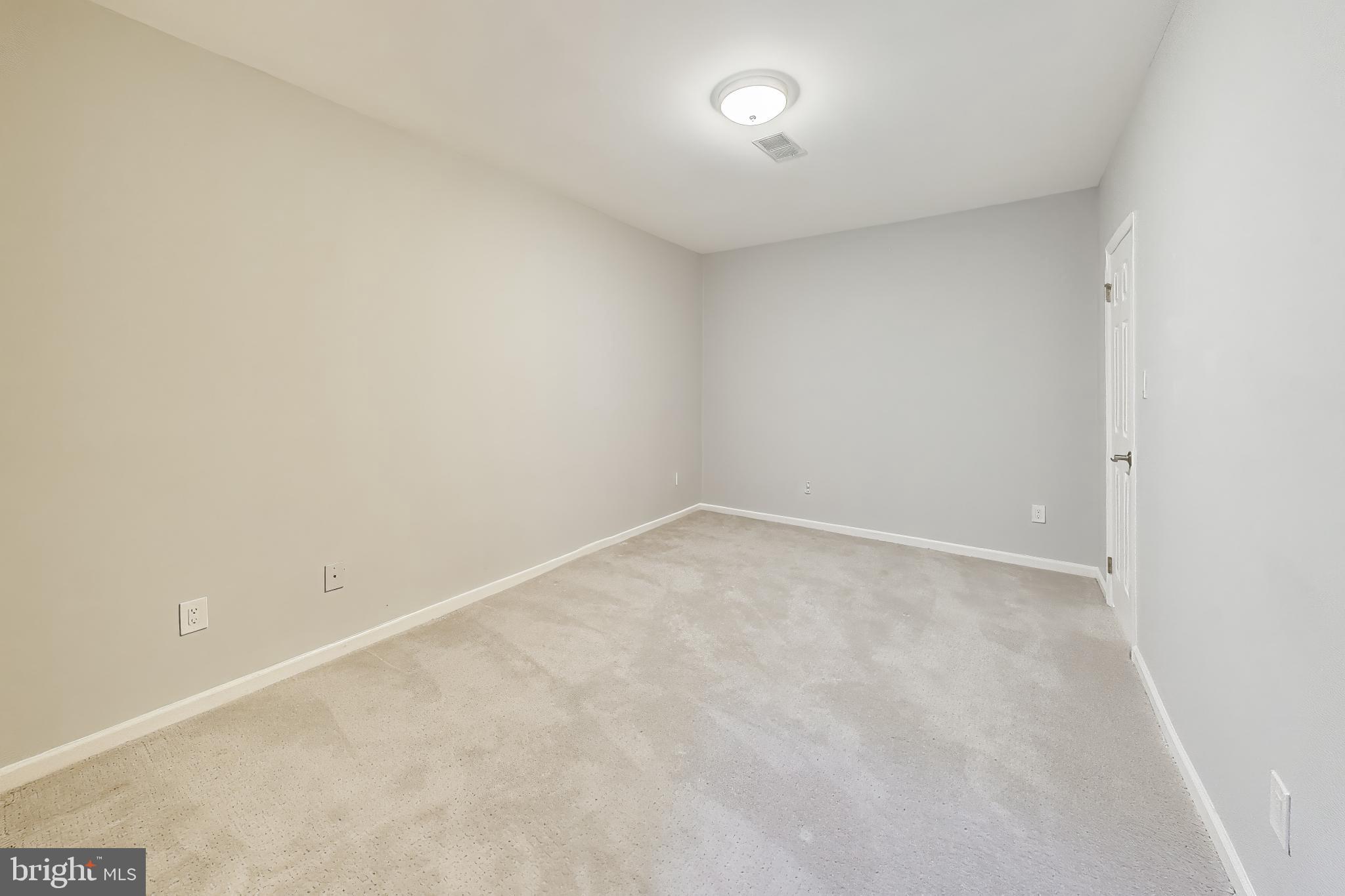 8017 Rising Ridge Road Bethesda, MD 20817 - Photo 38 of 54 an empty room with a natural light