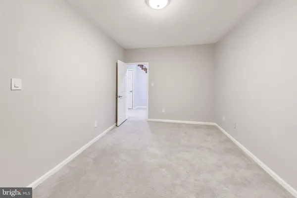 a view of a livingroom with a staircase