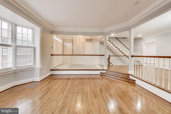 a view of entryway with wooden floor