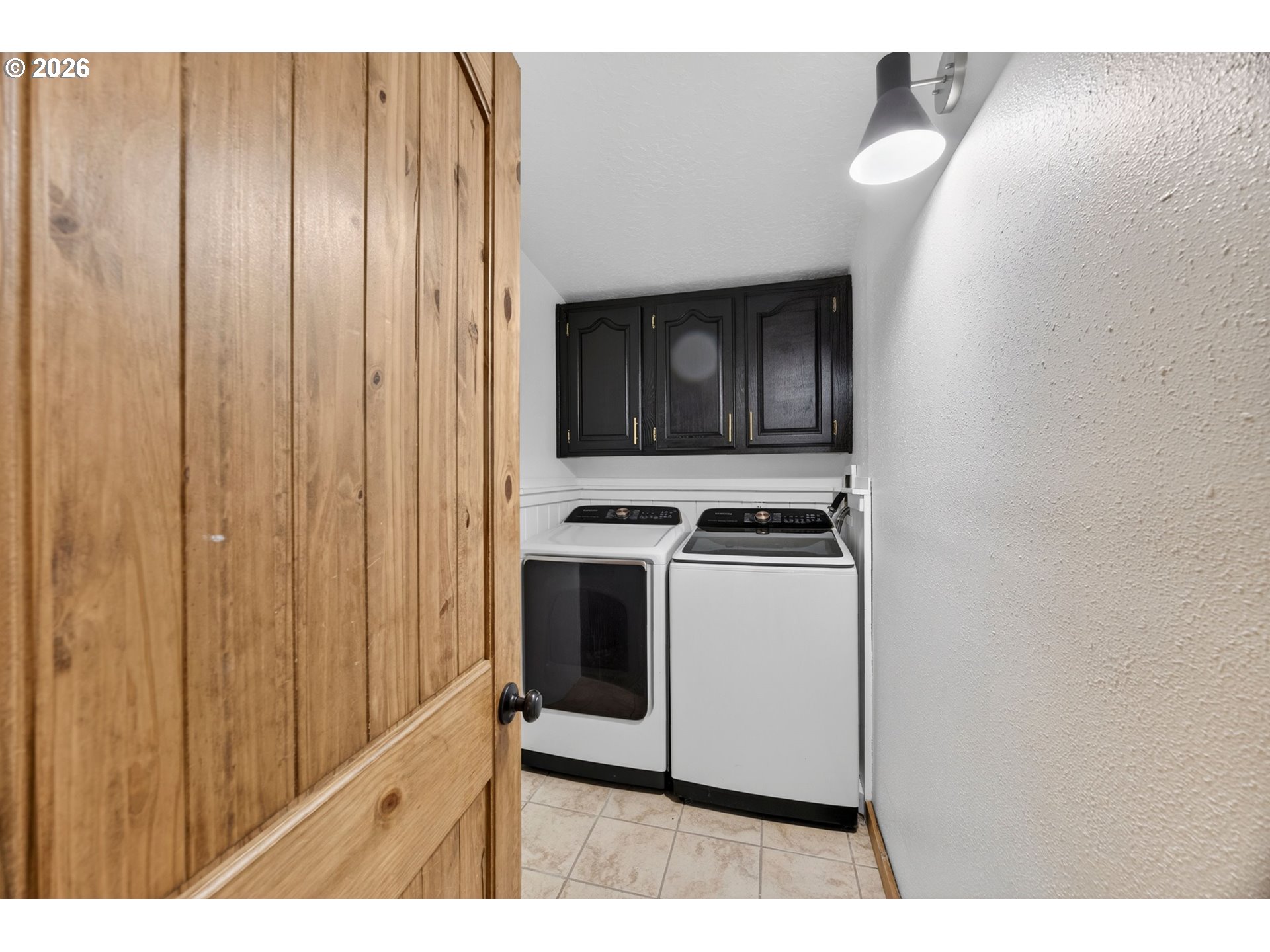 6895 Canary Road Westlake, OR 97493 - Photo 25 of 40 a kitchen with a stove and a microwave