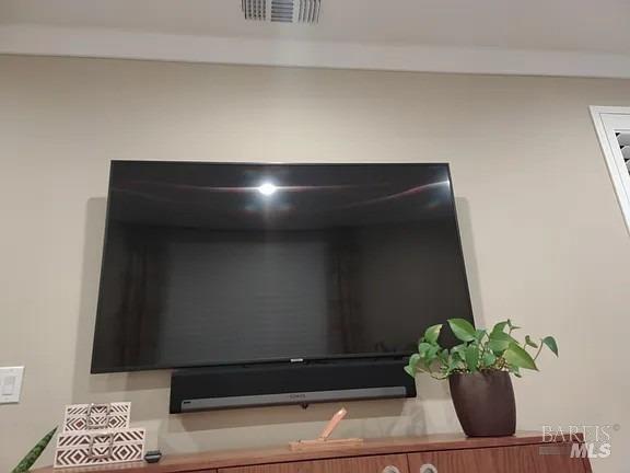 706 Hydrangea Drive Vacaville, CA 95687 - Photo 2 of 10 a living room with a potted plant