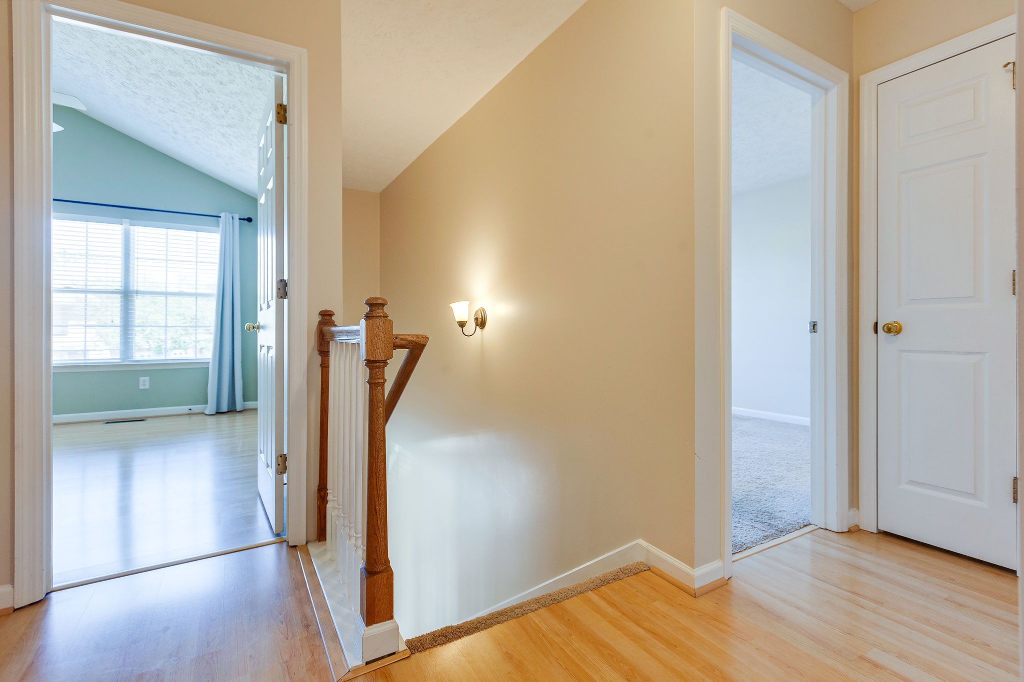 401 Compton Lane Franklin, TN 37069 - Photo 11 of 19 a view of a hallway view with wooden floor and staircase