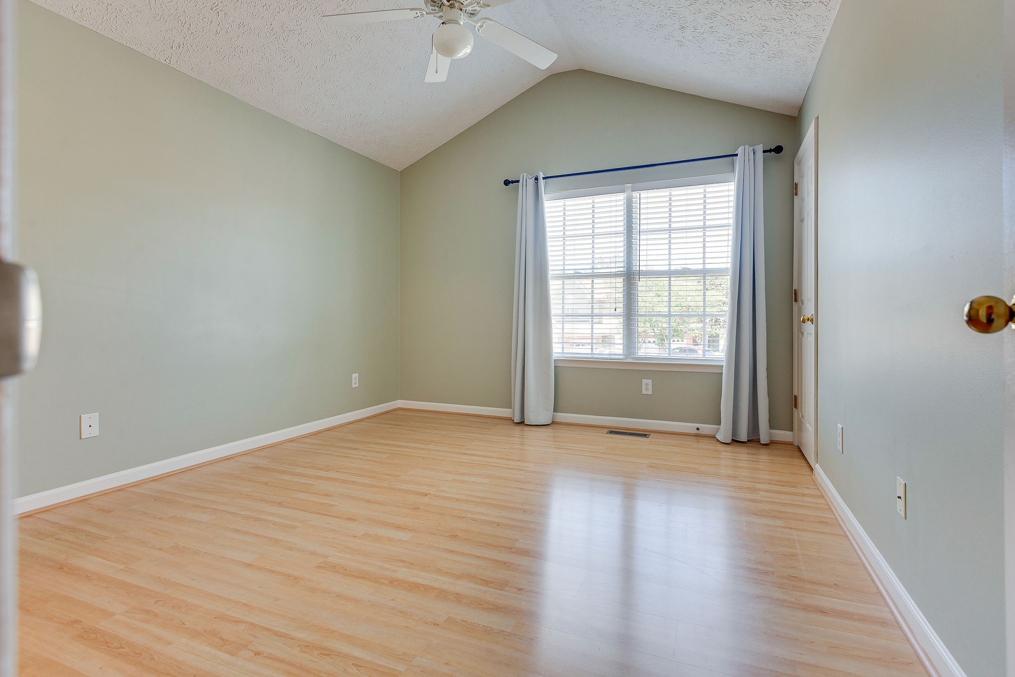 401 Compton Lane Franklin, TN 37069 - Photo 12 of 19 an empty room with wooden floor and windows