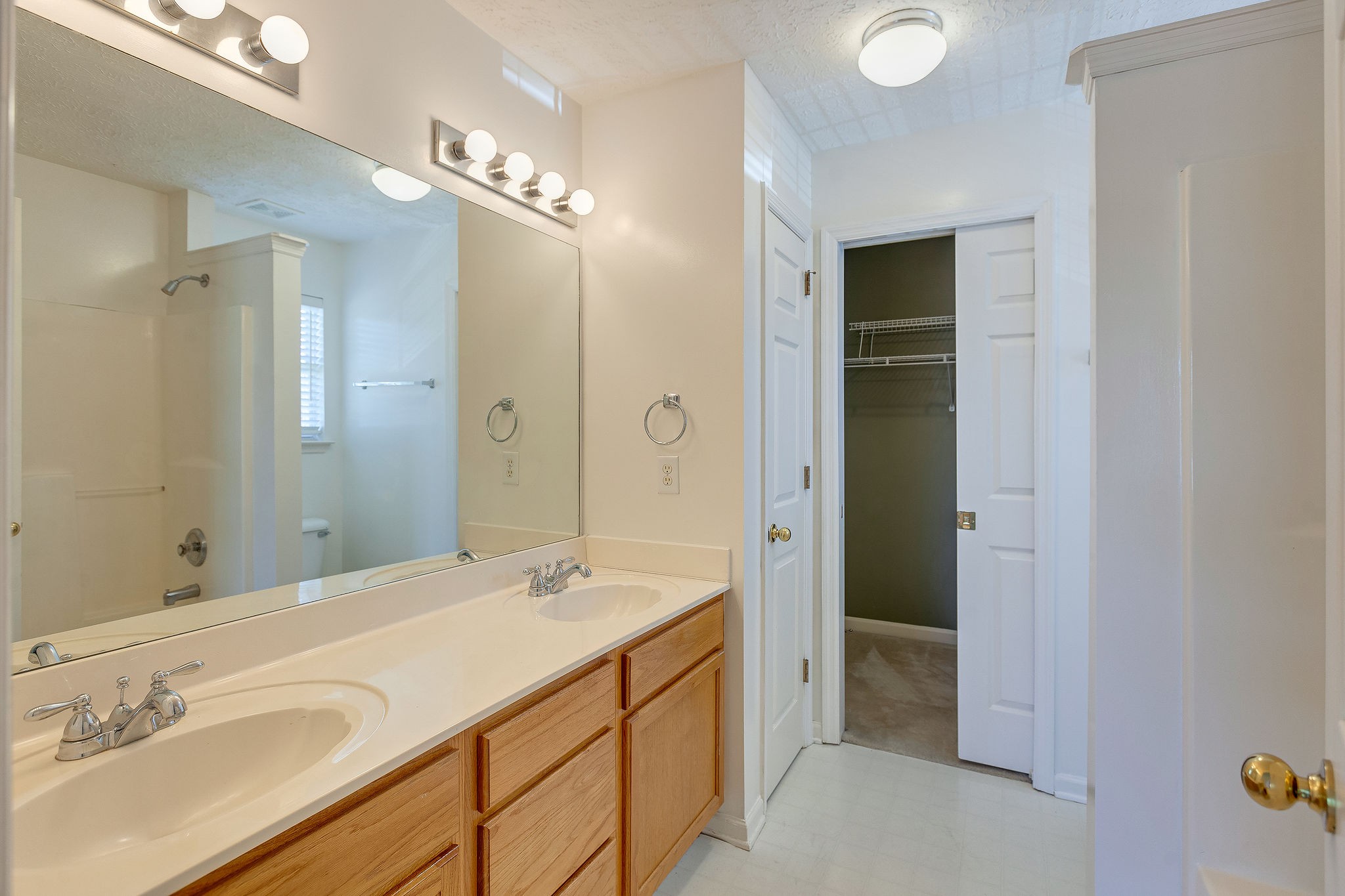 401 Compton Lane Franklin, TN 37069 - Photo 14 of 19 a spacious bathroom with a shower sink and mirror